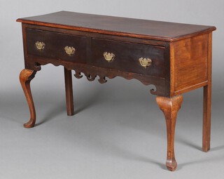 An Art Nouveau Georgian style oak dresser base, fitted 2 drawers, raised on cabriole supports 83cm h x 143cm w x 46cm d 