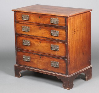 A Georgian mahogany and oak lined chest of 4 long drawers with later replacement brass drop handles, raised on bracket feet 82cm h x 88cm w x 46cm d 