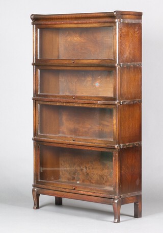 An oak 4 section Globe Wernicke bookcase 151cm h x 86cm w x 30cm d 