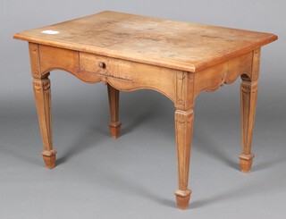 A 19th Century Continental rectangular carved oak side table fitted a frieze drawer, raised on square tapered supports with spade feet 76cm h x 116cm w x 78cm d 