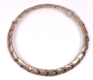 An Italian Tiffany & Co 1990's Chevron design 925 silver and 18k gold mounted necklace, marked 925 Italy, 122 grams, with original box and packaging 