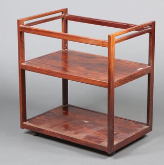 Heal's, Tottenham Court Road, a mid-century rectangular rosewood tea trolley 81cm h x 75cm w x 50.5cm d, the base with label.  CITES Article 10 Application Reference number 25GBA10A302TK