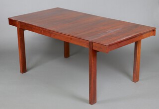 A mid-century rosewood extending dining table (possibly Heal's) with 1 extra leaf raised on square supports, 74cm h x 170cm w x 170cm l x 228cm long with extra leaf, CITES Article 10 Application Reference number 25GBA107TSOVY 