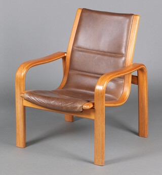 Ynve Ekstrom for Swedese, a late 20th Century teak Lamino easy chair upholstered in brown leather