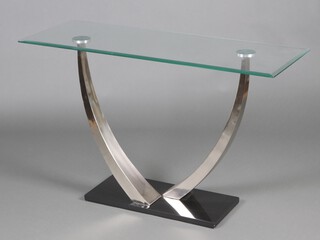 A mid-century rectangular plate glass console table, raised on brushed steel shaped supports 77cm h x 122cm w x 46cm d 
