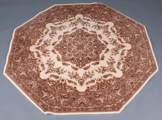 A 1980's octagonal white and brown ground machine made Persian style rug 152cm 