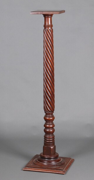 A William IV mahogany bed post torchere/jardiniere stand, raised on a square base 140cm h x 25cm 