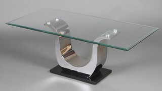 A mid-century rectangular plate glass coffee table raised on shaped brushed steel supports 48cm h x 126cm w x 56cm d 