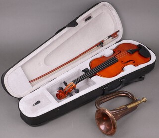 A Reveille copper and brass bugle together with a modern violin 