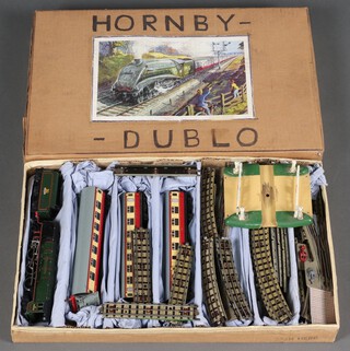 A Hornby OO gauge electric train set  The Duchess of Montrose, with 3 carriages and level crossing, contained in an associated box 