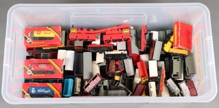 A quantity of Hornby OO gauge model train rolling stock, contained in a plastic box