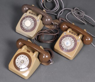 A grey dial telephone together with 2 brown dial telephones 