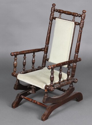 A child's 19th Century American rocking chair 72cm h x 42cm w x 46cm d  