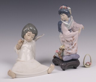 A Lladro figure - Angel Admirativo 14cm and 1 other Japonesita Arrodilladal  20cm (damage to hands) 