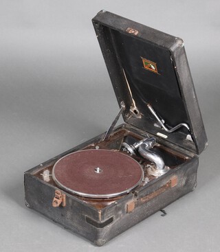 An HMV manual portable gramophone in a black fibre case 