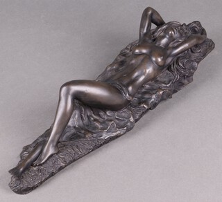 John Letts, a bronzed figure of a reclining semi-naked lady 10cm x 46cm 