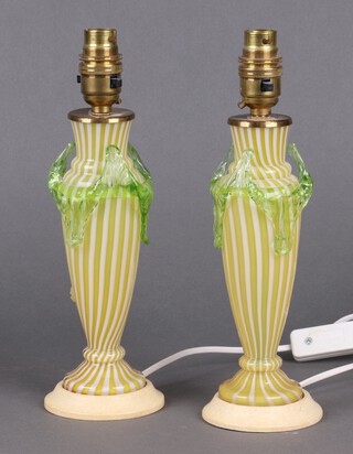 A pair of yellow and white striped Nailsea style glass table lamps 22cm 