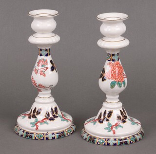 A pair of James Kent Eastern Glory floral patterned candlesticks 22cm 