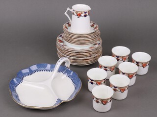 A Wedgwood Lynn Pattern 3 section hors d'oeuvres dish together with a 25 piece Hughes Fenton tea service with 11 tea plates (2 chipped), 9 saucers, 7 cups and a cream jug 

