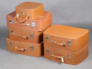 Four vintage "Antler" soft cased brown suitcases  and matching vanity case together with a Revelation suitcase 