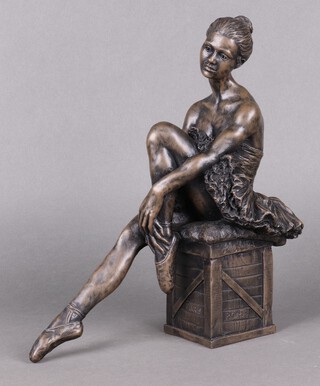 John Letts, a bronzed figure of a seated ballerina 33cm 