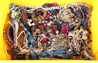 A collection of costume jewellery including beads and bangles, etc 