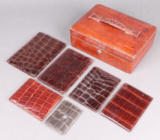 A leather jewellery box with hinged lid 8cm x 23cm x 17cm, 5 various wallets and a purse 