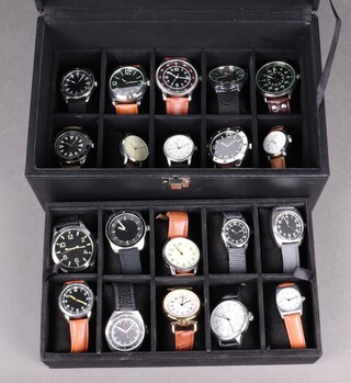 Twenty various fashion/replica military watches contained in a plush case  