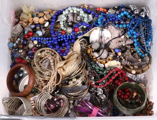 A collection of costume jewellery including beads and bangles 