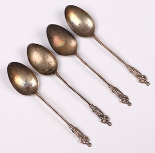 Four Edwardian silver apostle spoons Birmingham 1904 by A J Bailey, 22.8 grams (misshapen) 