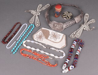 A mesh belt, a bead work bag and a small collection of costume jewellery 
