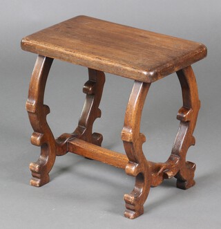A 17th Century style rectangular oak stool on shaped supports with H framed stretcher 43cm h x 45cm x 28cm 
