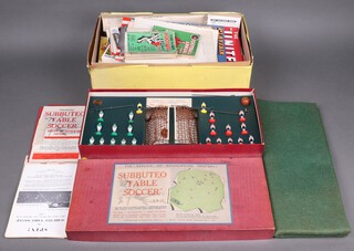 A Subbuteo table soccer game, circa 1950's, complete, together with a collection of football programmes, Sunday Chronicle Football annual, etc