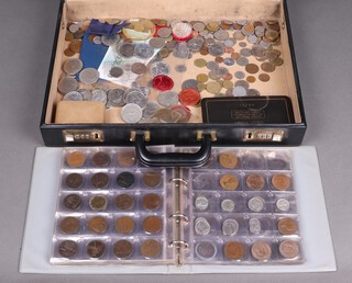 An attache case containing a collection of world coins  