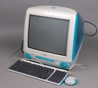 A Vintage Apple Mac computer, mouse and keyboard (untested and sold for parts only) 