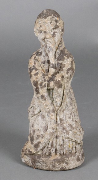 A well weathered concrete garden  figure of a standing Chinese sage 39cm 