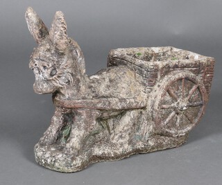 A well weathered concrete garden  planter in the form of a donkey with card 38cm 