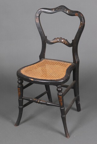A Victorian papier mache bedroom chair with shaped mid rail and woven cane seat