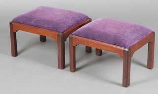 A pair of Georgian style rectangular mahogany footstools with purple upholstered drop in seats 28cm h x 48m w x 40cm 