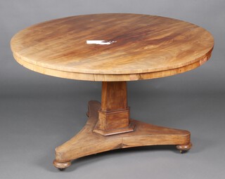 A William IV bleached mahogany circular breakfast table, raised on a chamfered column and triform base with bun feet 77cm h x 120cm (split to top) 
