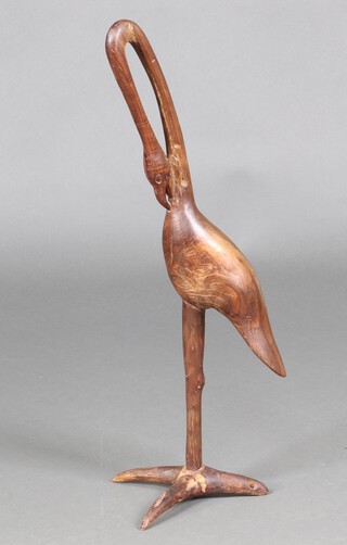 An African carved hardwood figure of a flamingo 65cm 