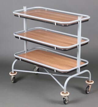 A mid-century industrial style rectangular tubular metal and laminate 3 tier trolley 98cm h x 82cm w x 50cm d