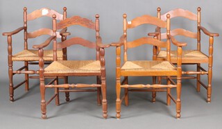 A carved elm ladder back carver chair with woven rush seat together with 3 other similar carver chairs
