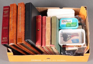 Four albums of mint and used world stamps, 4 albums of GB QEII first day covers and other covers 