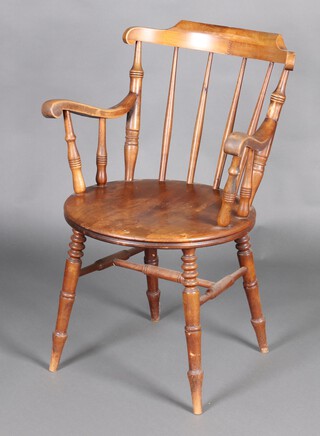 A 19th Century beech stick and rail back kitchen carver chair on turned supports with H framed stretcher 92cm h x 61cm w x 52cm d 