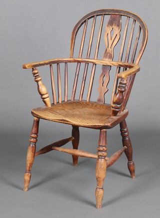 A 19th Century elm stick and rail back Windsor chair on turned supports with H framed stretcher 92cm h x 60cm w x 38cm d 