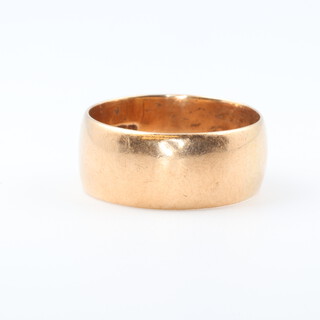 A 9ct yellow gold plain wide wedding band, size Q, 5.6 grams