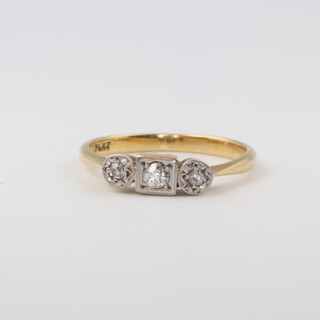 A 1930's 18ct yellow gold and platinum, 3 stone diamond ring, diamonds approx. 0.21ct, size P, 2.8 grams 