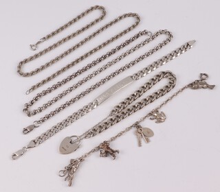 A silver spiral link chain 49cm, a silver belcher link chain 51cm, a silver curb link bracelet with heart shaped padlock, silver curb link bracelet hung 5 charms and a silver identity bracelet 126 grams 