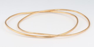 Two yellow gold, testing as 18ct bangles, 10 grams 